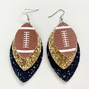 Detailed close-up of triple-layered football earrings with brown faux leather and sequins