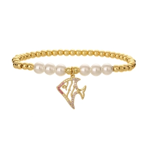 Minimalist gold beaded bracelet with pearls and a crystal-encrusted fish charm pendant