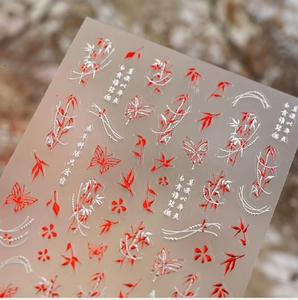 Macro detail of Chinese style nail stickers with bamboo leaves and calligraphy art
