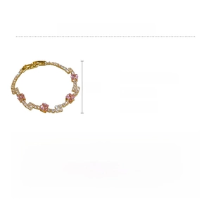 Detail view of pink square zircon bracelet with gold copper plating and product dimensions