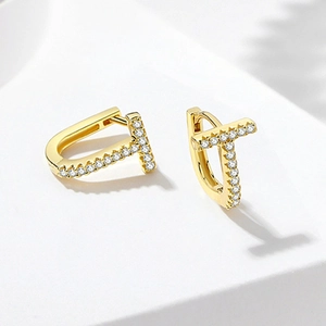 Minimalist T-shaped gold hoop earrings with white micro-pave cubic zirconia stones
