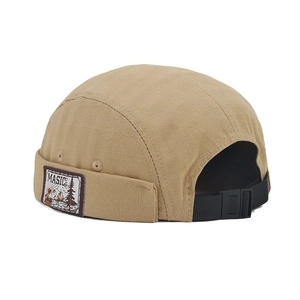 Khaki docker hat with textured fabric and MASIC mountain patch on a white background