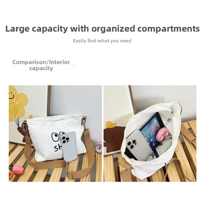 Spacious interior of canvas crossbody bag showing compartments for tablet and essentials