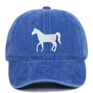 Close-up of white horse embroidery on vintage washed cotton baseball cap fabric