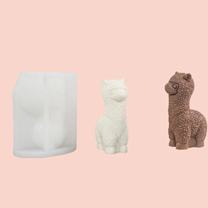 Detailed view of DIY alpaca silicone mold with finished white and brown resin models