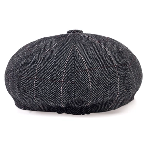 Dark grey herringbone newsboy cap with red windowpane check and elastic back