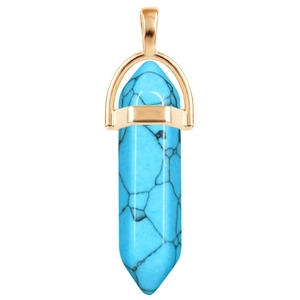 Detail of hexagonal turquoise pendant with rose gold bail and natural black veins