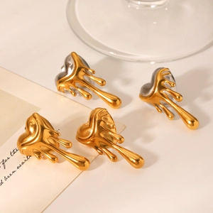 Lava heart earrings with melting metal effect in bicolor gold and silver finishes