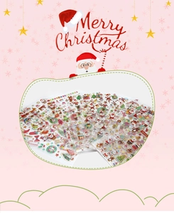 Detail of transparent Christmas stickers featuring Santa, reindeer and golden foil stars