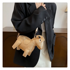 Detailed view of the creative gold horse-shaped PU leather crossbody bag with chain strap