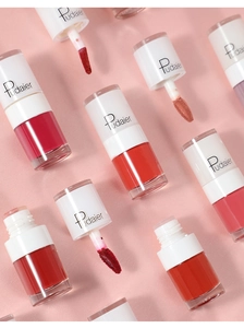 Flat lay macro view of multiple matte velvet liquid lipstick tubes in various colors