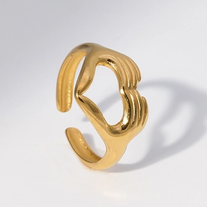 Minimalist gold titanium steel open ring featuring a unique two hands holding a heart design
