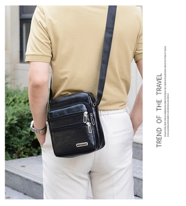 Men's black PU leather crossbody bag featuring multiple zipper compartments for travel