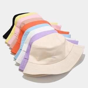 Foldable cotton bucket hat with smile embroidery available in multiple vibrant colors