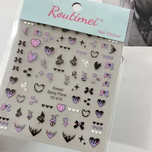 Detail of sweet spicy punk nail stickers with heart, flame, and bow designs, model YO-018