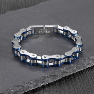 Mens stainless steel bicycle chain bracelet in silver and blue on dark stone base