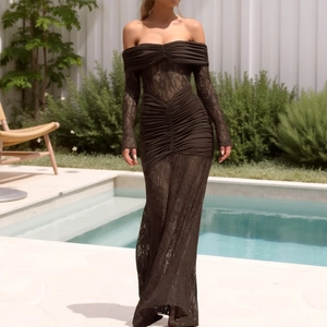Detailed texture of brown lace on an off-shoulder long sleeve mermaid dress