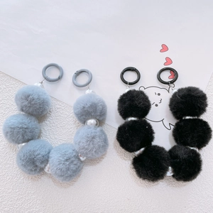 Gray and black plush ball phone charms with pearl chain and circular spring clasp hooks