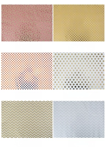 Detail of six festive wrapping paper patterns including gold dots and stripes for gifts