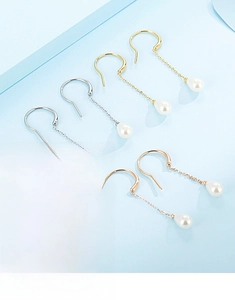 Detailed trio of teardrop shell earrings in silver, gold, and rose gold plating