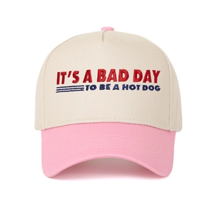 Two-tone baseball cap in beige and pink with embroidered funny quote and stitched brim