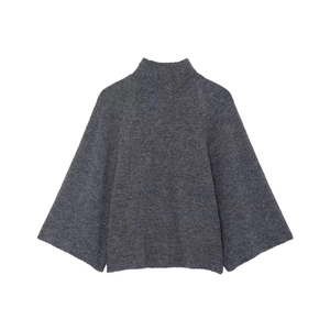 Women's oversized grey turtleneck knit sweater with fashionable wide bell sleeves