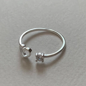 Minimalist S925 sterling silver open ring featuring a heart design and zircon stone