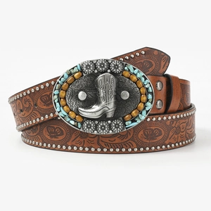 Bohemian brown leather belt with vintage floral pattern and turquoise buckle on white background