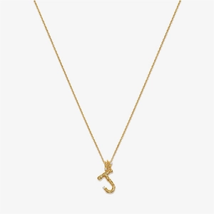 Detail of gold letter J initial necklace with bamboo texture and diamond accents