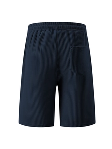 Detailed back view of navy blue corduroy shorts with elastic waist and single rear pocket
