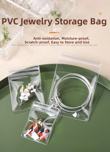Three clear PVC jewelry pouches on green tray for anti-oxidation ring storage