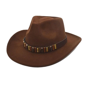 Detail of dark brown wool felt cowboy hat with leather band and vintage bronze rivets