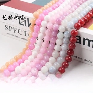 Macro shot of smooth colorful eagle eye stone round beads for DIY jewelry making accessories