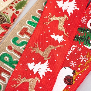 Christmas burlap ribbons with reindeer and snowflake patterns in festive colors