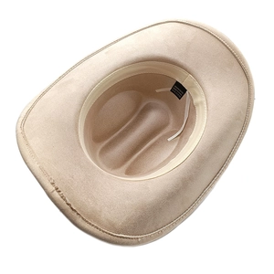 Detail view of western cowboy hat interior showing 100% polyester label and black inner lining