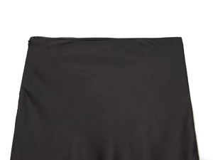 Detail shot of the black skirt waistline featuring a side invisible zipper closure