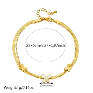 Gold-tone layered butterfly anklet featuring shell inlay and double-strand chain design