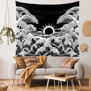 Detail of Great Wave tapestry with black sun art on living room wall decoration