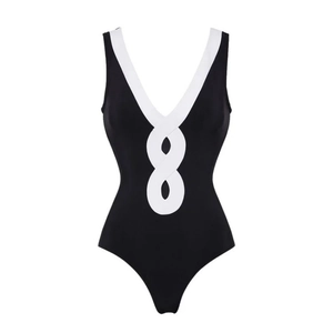Minimalist black one-piece swimsuit for women with a white contrast V-neck design