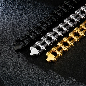 Bracelet motard pour homme en acier inoxydable aux finitions noir, doré et argenté