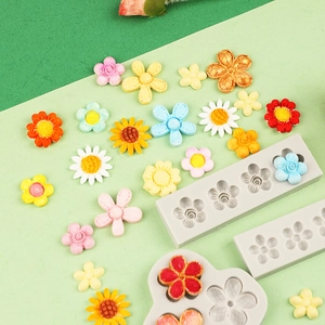 DIY silicone flower molds with colorful resin floral decorations for cake toppers