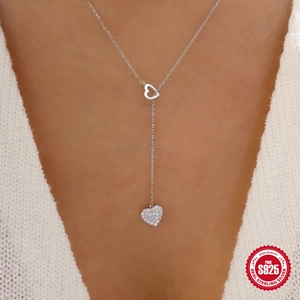 S925 Sterling Silver Y-shape necklace with double hearts and pavé crystals on a model