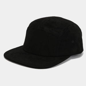 Detail of a black suede 5-panel camper hat featuring side metal eyelets and a flat brim