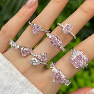 Luxury S925 sterling silver rings with pink heart and pear cut stones on hand