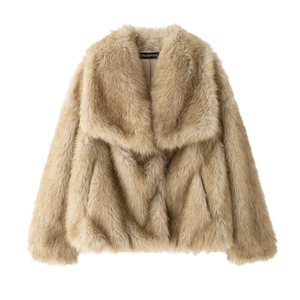 Detailed view of brown faux fur jacket showing the plush texture and large lapel collar