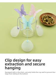 Detail showing butterfly tea infusers clipped to glasses with secure anti-slip design