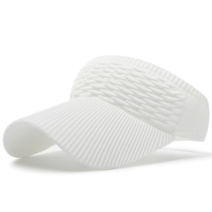 Close-up of white sun visor with waffle knit texture and ribbed edge detail