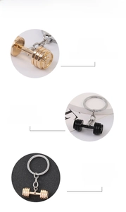 Macro detail of high-quality alloy dumbbell keychains in gold, black, and silver finishes