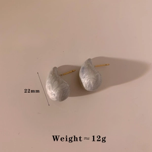 Detail showing grey marble enamel teardrop earrings with dimensions 22mm and weight 12g