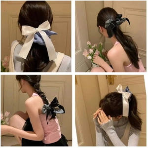 Detail of plaid bow scrunchies in blue and black colors on various hairstyles